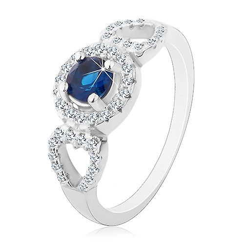 Inel realizat din argint 925, zirconiu albastru rotund, contur inimă lucioasă, contur pe laterale - Marime inel: 64
