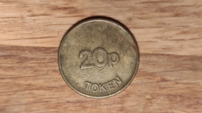 Jeton sau Token 20 penny posibil de metrou sau telefon foto