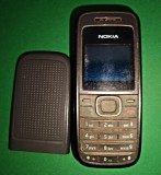 Telefon Nokia 1208 vintage, fără acumulator sau cablu. Tastatură alfanumerică taste cauciucate. 10.2/4.2 cm