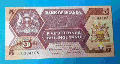Uganda - 5 Shilingi Tano 1987 - bancnota UNC - Superba foto
