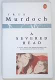 A SEVERED HEAD , A NOVEL ABOUT THE FRIGHTFULNESS AND RUTHLESSNESS OF BEING IN LOVA by IRIS MURDOCH , 1976 *TEXT IN LIMBA ENGLEZA