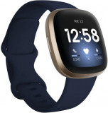 Cumpara ieftin Ceas activity tracker Fitbit Versa 3, NFC, WiFi, Bluetooth (Albastru/Auriu)