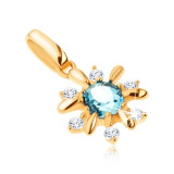 Cumpara ieftin Pandantiv din aur 375 - floare decorată cu pietre transparente şi topaz albastru