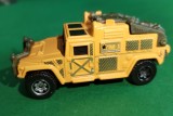 Hummer Matchbox 2000 Mattel Die-cast scara 1:70 Thailanda, metal și plastic kaki, prelata basculabilă Stare bună, vopsea galben-portocaliu W