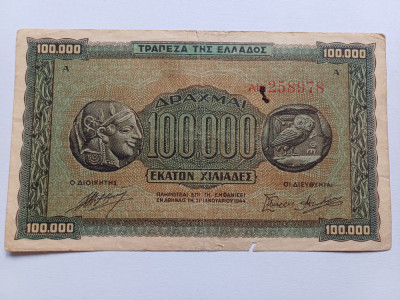 Grecia - 100.000 drahme- drachmai 1944 foto