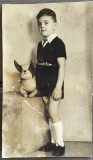 1943 Foto veche de epoca copil / baietel cu jucarie/ Bucuresti /Bd. Elisabeta / istoria copilariei si jucariilor, stil de viata, burghezie 12x7 cm