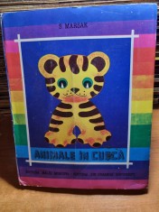 carte pentru copii in relief - animale in cusca - din anul 1980 foto