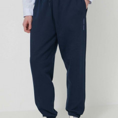 Tommy Jeans pantaloni de trening din bumbac culoarea bleumarin, uni DM0DM18378