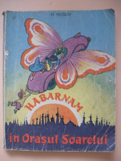 N. NOSOV - HABARNAM IN ORASUL SOARELUI ( ilustratii A. Laptev ) - 1962 foto