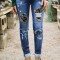 G735-444 Blugi cu taieturi decorative si insertie animal print