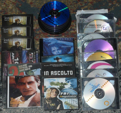 lot 50 dvd cu filme si seriale,pc diverse,la doar 50 lei foto