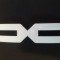 Emblema grila calandru DACIA ( Logo nou) 628906394R. Nou si original Renault.