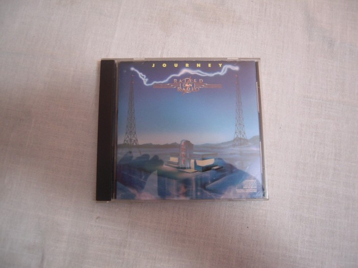 CD original: JOURNEY - Raised On Radio (1986), Stare foarte buna