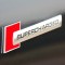 Emblema auto model &bdquo;SUPERCHARGED&rdquo;, reliefata 3D, dimensiune 10 x 1 cm
