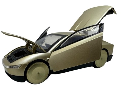 Macheta Tesla Cybercab robotaxi aurie cu sunete lumini deschide usile si capota foto