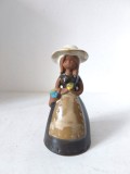 Figurina ceramica / clopotel ceramic in forma de tanara domnisoara cu cos cu flori, vintage, anii 70, 14cm inaltime