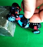Minge auto Hot Wheels 2012 Mattel Ballistiks Full Force Sea Speeder Black Red Octopus Y0029. Bila lovita se transformă in auto de 9 cm. Stea roșie W