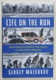 LIFE ON THE RUN , ONE FAMILY'S SEARCH FOR PEACE IN WAR - TORN UKRAINE by SERGEY MAIDUKOV , 2024