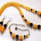 set colier ,bratara reglabila si cercei cu jad galben si onix negru fatetat 41532
