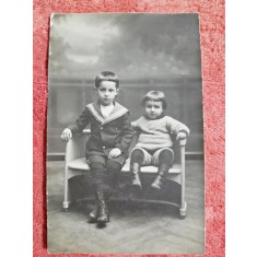 Fotografie tip carte postala, baiat si fetita, perioada interbelica