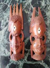 Capete africane - doua sculpturi tribale africane (barbat si femeie) foto