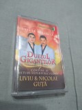 Cumpara ieftin CASETA AUDIO MANELE DUELUL GIGANTILOR ORIGINALA RARA!!