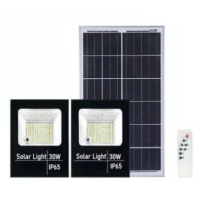 Set 2 proiectoare LED SMD 30W cu incarcare solara Flippy, panou solar, cu telecomanda, suport prindere, material ABS, 1.2AH, 200LED-uri, 13x13.5 cm, n foto