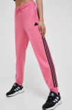 Cumpara ieftin Adidas pantaloni de trening culoarea roz, cu imprimeu