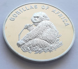 115. Moneda Uganda 1000 shillings 2003 (Gorillas of Africa - eating Gorilla)