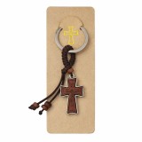 Cumpara ieftin Breloc religios cu cruce din lemn si figurina Isus, breloc crestin cu rama metalica, accesoriu chei sau rucsac, design compact 3 cm