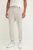 adidas pantaloni de trening Essentials culoarea bej, cu imprimeu, JE6317