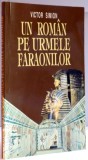 UN ROMAN PE URMELE FARAONILOR , DE LA PARALELA 45 LA TROPICUL RACULUI de VICTOR SIMION , 1998