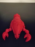 Suport cutit in forma de Crab Rac rosu material sintetic cu 2 cutite mici