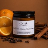 Portocală cuișoare și scorțișoară lum&acirc;nare parfumată din ceară naturală de soia &icirc;n sticlă ambră