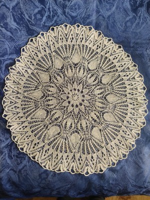 Mileu crem tricotat manual, aspect deosrbit foto