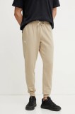 Under Armour pantaloni de trening culoarea verde, neted