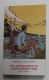 THE ADVENTURES OF HUCKLEBERRY FINN by MARK TWAIN , ANII ' 2000