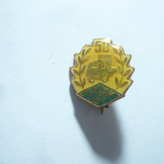 Insigna Romania 50 Ani Transport Marfa ,metal si email , h=1,7cm