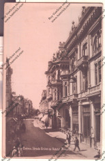 CARTE POSTALA*ROMANIA*CRAIOVA*STRADA UNIREI CU HOTELUL MINERVA foto