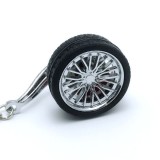 Cumpara ieftin Breloc metalic anticoroziv, model roata auto, Argintiu