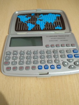 DICTIONAR/TRASLATOR 12 LIMBI FUNCTIONEAZA TREBUIE SCHIMBATA BATERIA foto