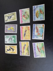 LOT TIMBRE NESTAMPILATE SERIE SCURTA INDONEZIA 1964 PASARI GUINEEA PESTI STAMPI foto