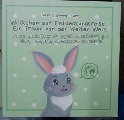 Wolkchen auf Entdeckungsreise - Ein traum von der weiten welt (Nori intr-o calatorie de descoperire - Un vis al lumii largi, carte in limba germana) foto