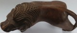Statueta lemn, Leu racnind