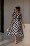 Rochie dama midi cu buline bleumarin si decolteu in V