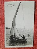 Fotografie tip carte postala, cu barca pe mare la Mangalia, 1937