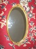 OGLINDA SUPERBA CU MODEL ,CULOARE AURITA ! LUNGIME 42 CM , LATIME 24 CM