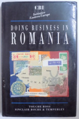 DOING BUSINESS IN ROMANIA by TOUCHE ROSS, SINCLAIR ROCHE &amp;amp; TEMPERLEY 1992 foto