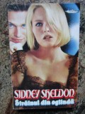 STRAINUL DIN OGLINDA-SIDNEY SHELDON