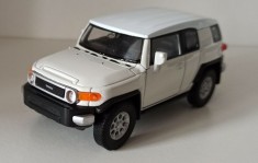 Macheta Toyota FJ Cruiser 2010 alb - Welly 1/36